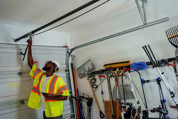 Professional Garage Door Spring Repair technician working in Golden's Bridge, NY